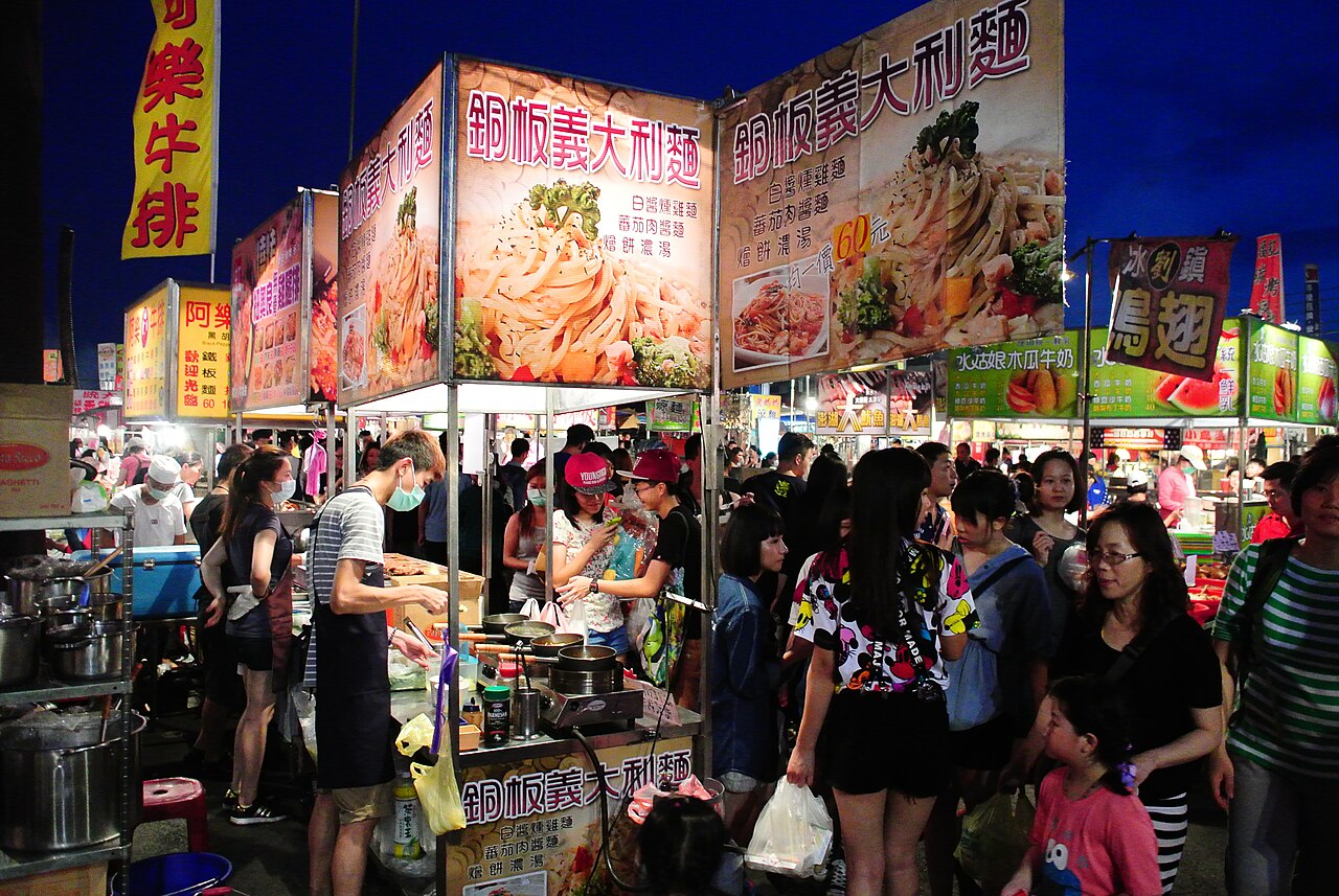 Food stalls and visitors at Garden Night Market in Tainan